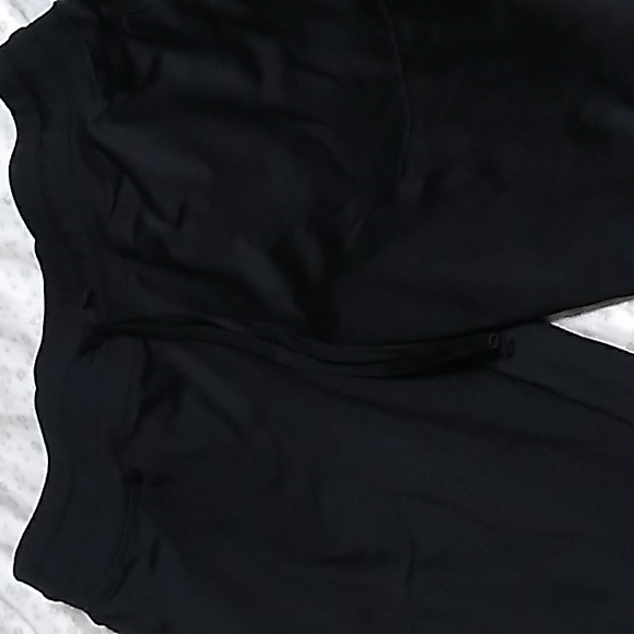 The pants are shiny and a slim jogger - Picture 2 of 8